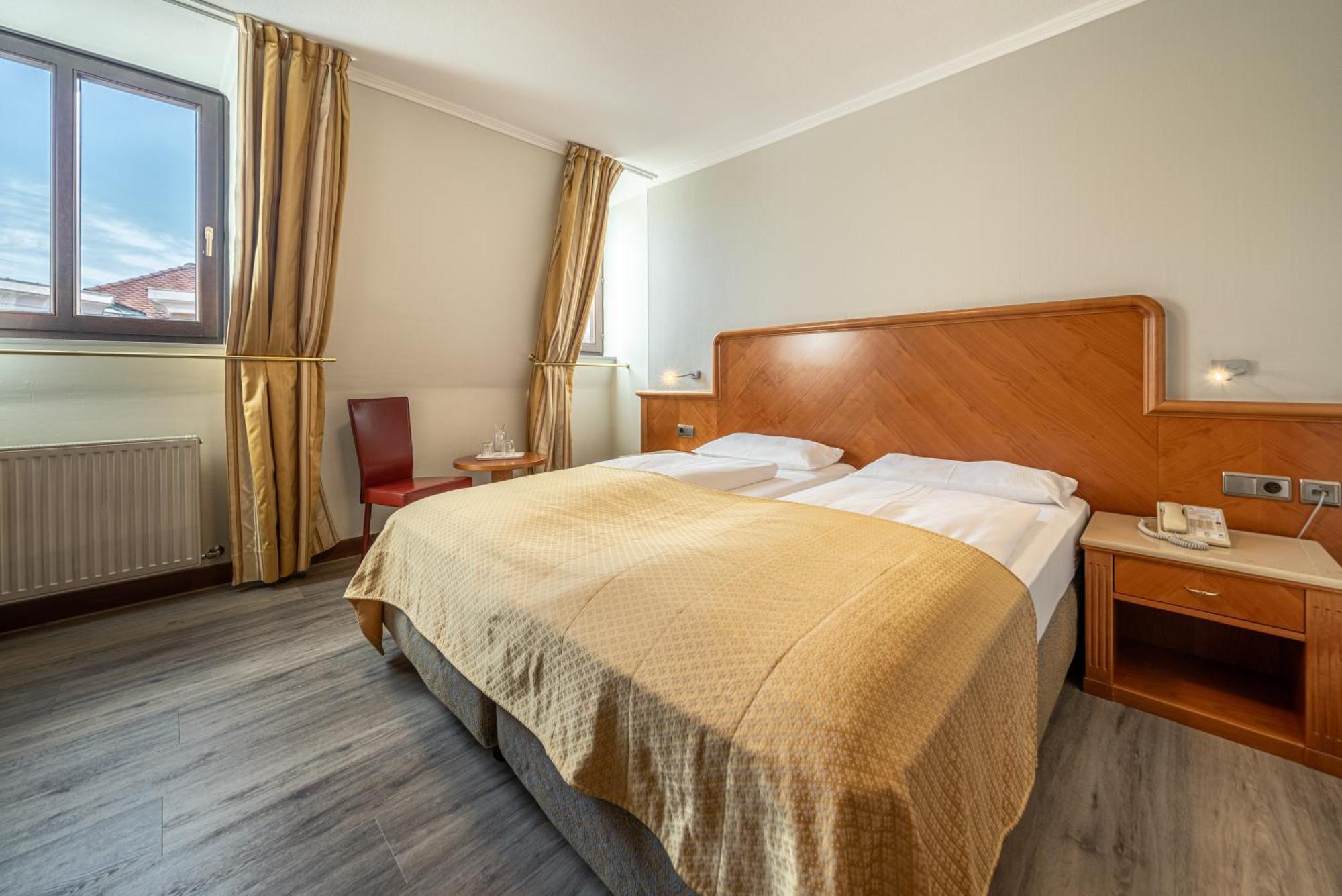 Neue Post I Self Check-in Hotel Innsbruck